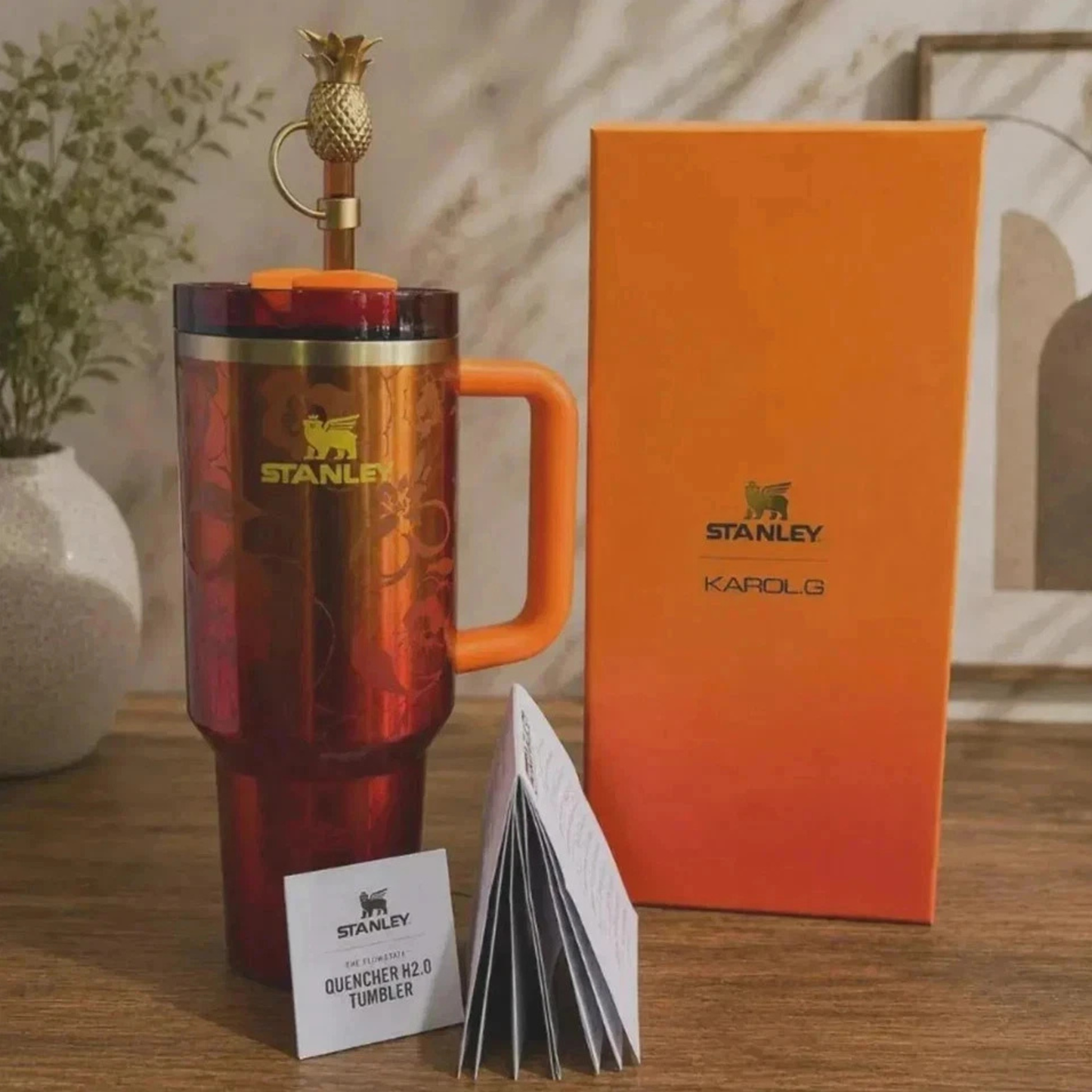 The Stanley 1913 x KAROL G 40 oz Quencher H2.O FlowState Tumbler